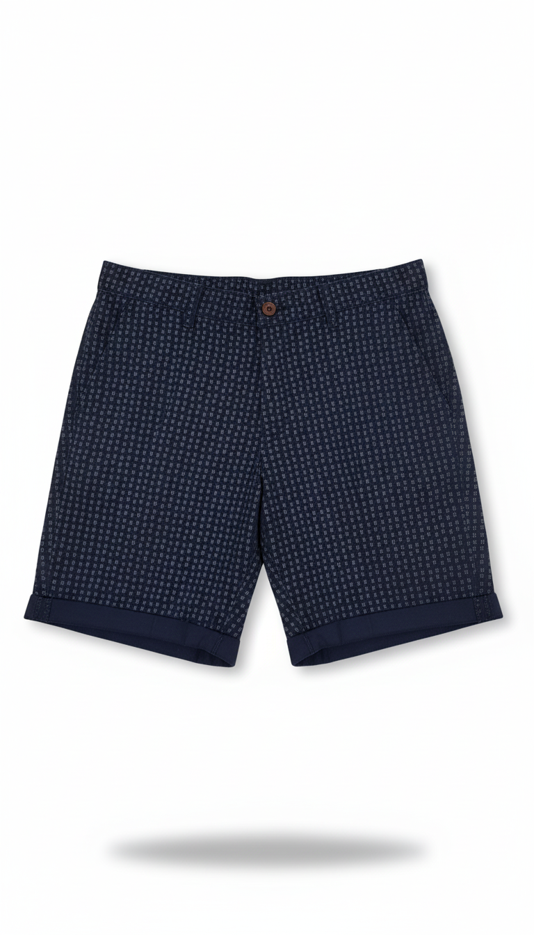 Navy patterned shorts on a white background